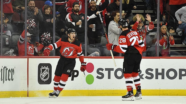 Nov 9, 2021; Newark, New Jersey, USA; New Jersey Devils left wing Andreas Johnsson (11) reacts after scoring a goal against the Florida Panthers during the first period at Prudential Center. Mandatory Credit: Catalina Fragoso-USA TODAY Sports