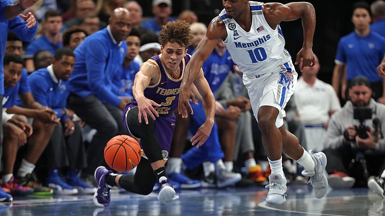 Nov 9, 2021; Memphis, Tennessee, USA; Tennessee Tech Golden Eagles guard Keishawn Davidson (3) looses control of the ball to Memphis Tigers guard Alex Lomax (10) during the first half at FedExForum. Mandatory Credit: Petre Thomas-USA TODAY Sports