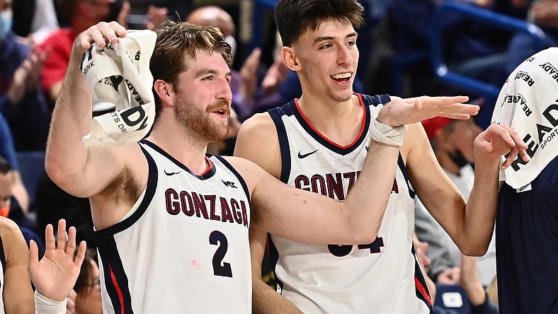 Gonzaga Bulldogs forward Drew Timme (2) and Gonzaga Bulldogs center Chet Holmgren (34) celebrate after a Gonzaga score against the Dixie State Trailblazers in the second half at McCarthey Athletic Center. The Bulldogs won 97-63. Mandatory Credit: James Snook-USA TODAY Sports