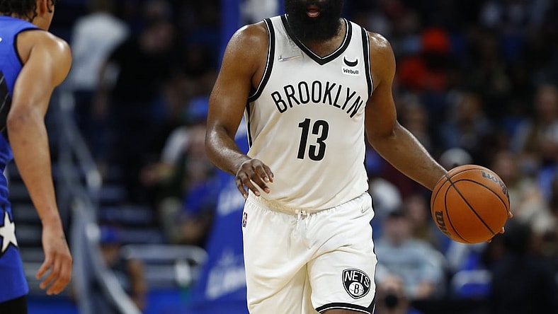 Nov 10, 2021; Orlando, Florida, USA;  Brooklyn Nets guard James Harden (13) dribbles the ball against the Orlando Magic during the second quarter at Amway Center. Mandatory Credit: Kim Klement-USA TODAY Sports