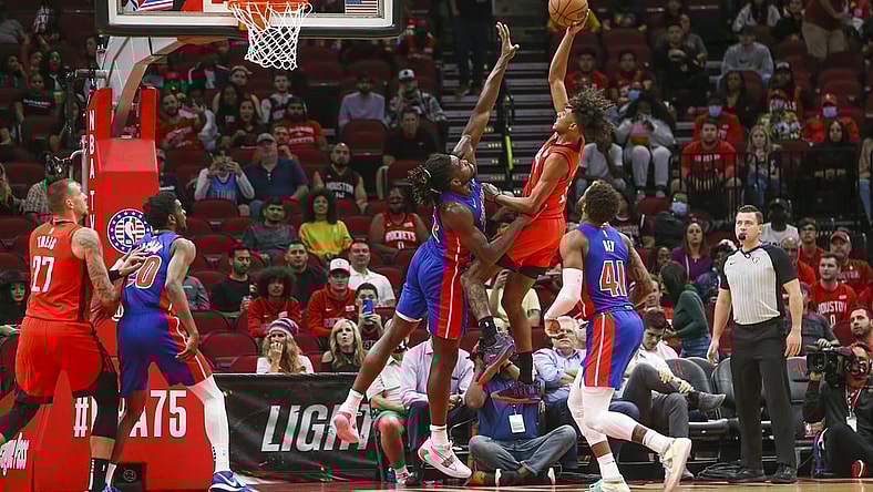Nov 10, 2021; Houston, Texas, USA; Houston Rockets guard Jalen Green (0) shoots the ball over Detroit Pistons center Isaiah Stewart (28) in the first quarter at Toyota Center. Mandatory Credit: Thomas Shea-USA TODAY Sports