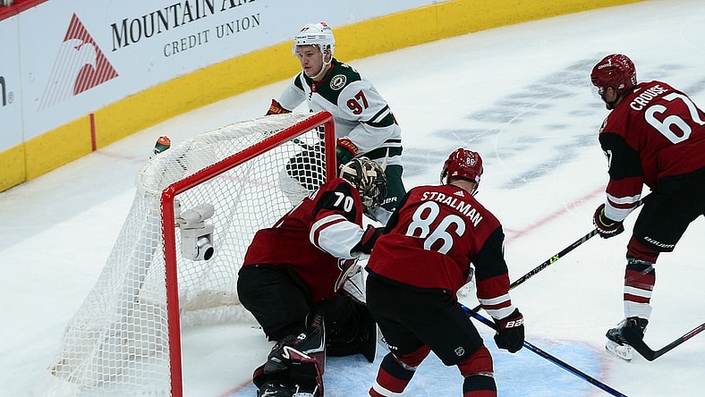 Nov 10, 2021; Glendale, Arizona, USA; Minnesota Wild left wing Kirill Kaprizov (97) scores a goal against the Arizona Coyotes during the second period at Gila River Arena. Mandatory Credit: Joe Camporeale-USA TODAY Sports