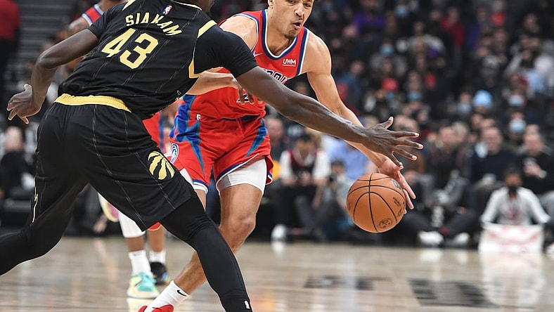 Nov 13, 2021; Toronto, Ontario, CAN; Detroit Pistons guard Cade Cunningham (2) dribbles the ball against Toronto Raptors forward Pascal Siakam (43) in the first half at Scotiabank Arena. Mandatory Credit: Dan Hamilton-USA TODAY Sports
