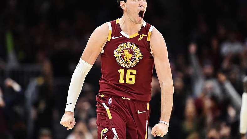 Nov 13, 2021; Cleveland, Ohio, USA; Cleveland Cavaliers forward Cedi Osman (16) celebrates after a three pointer during the second half against the Boston Celtics at Rocket Mortgage FieldHouse. Mandatory Credit: Ken Blaze-USA TODAY Sports
