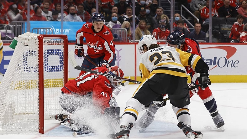 Nov 14, 2021; Washington, District of Columbia, USA; Washington Capitals goaltender Vitek Vanecek (41) makes a save on Pittsburgh Penguins left wing Brock McGinn (23) during the second period at Capital One Arena. Mandatory Credit: Geoff Burke-USA TODAY Sports