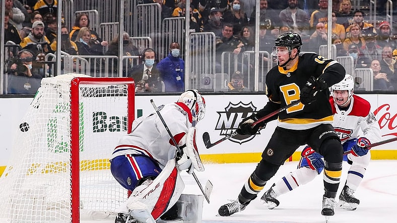 Nov 14, 2021; Boston, Massachusetts, USA; Boston Bruins center Charlie Coyle (13) scores a goal during the third period against the Montreal Canadiens at TD Garden. Mandatory Credit: Paul Rutherford-USA TODAY Sports