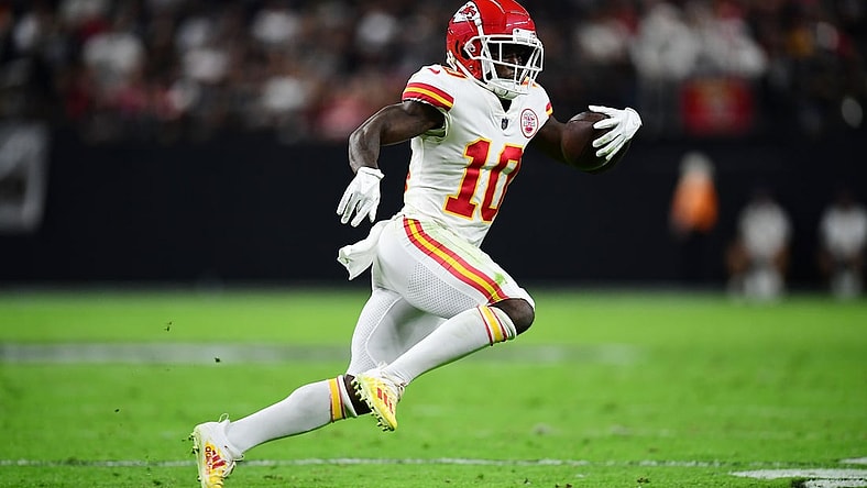 Nov 14, 2021; Paradise, Nevada, USA; Kansas City Chiefs wide receiver Tyreek Hill (10) runs the ball against the Las Vegas Raiders during the first half at Allegiant Stadium. Mandatory Credit: Gary A. Vasquez-USA TODAY Sports