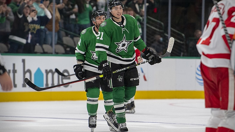 Nov 16, 2021; Dallas, Texas, USA; Dallas Stars left wing Jason Robertson (21) skates off the ice after he scores an empty net goal against the Detroit Red Wings during the third period at the American Airlines Center. Mandatory Credit: Jerome Miron-USA TODAY Sports