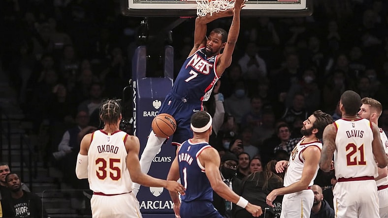 Nov 17, 2021; Brooklyn, New York, USA; Brooklyn Nets forward Kevin Durant (7) dunks in the first quarter against the Cleveland Cavaliers at Barclays Center. Mandatory Credit: Wendell Cruz-USA TODAY Sports