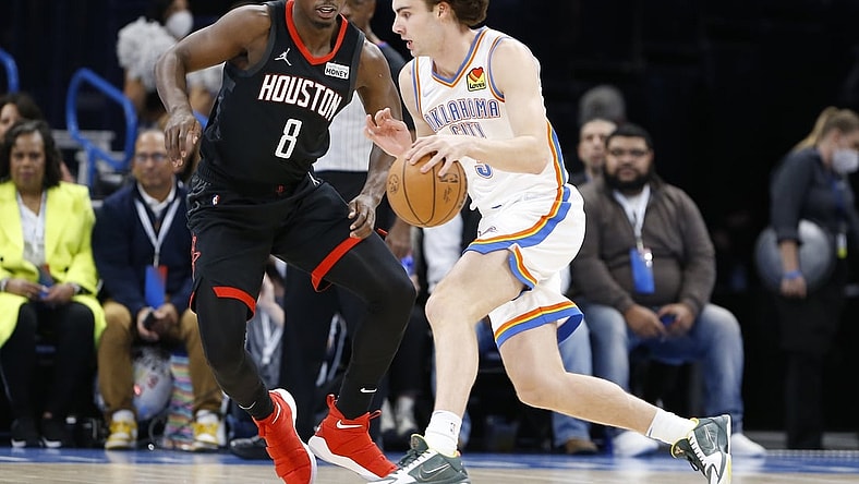 Nov 17, 2021; Oklahoma City, Oklahoma, USA; Oklahoma City Thunder guard Josh Giddey (3) drives to the basket against Houston Rockets forward Jae'Sean Tate (8) during the first quarter at Paycom Center. Mandatory Credit: Alonzo Adams-USA TODAY Sports