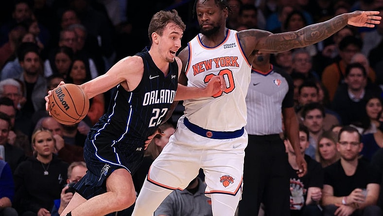 Nov 17, 2021; New York, New York, USA; Orlando Magic forward Franz Wagner (22) drives to the basket against New York Knicks forward Julius Randle (30) during the first half at Madison Square Garden. Mandatory Credit: Vincent Carchietta-USA TODAY Sports