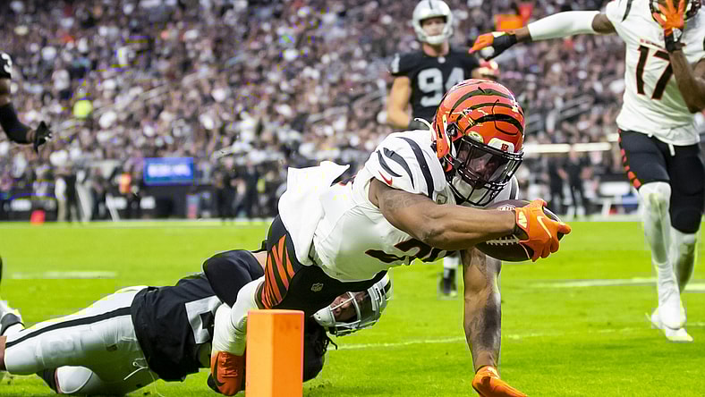 Nov 21, 2021; Paradise, Nevada, USA; Cincinnati Bengals running back Joe Mixon (28) dives into the end zone to score a touchdown against the Las Vegas Raiders in the first half at Allegiant Stadium. Mandatory Credit: Mark J. Rebilas-USA TODAY Sports