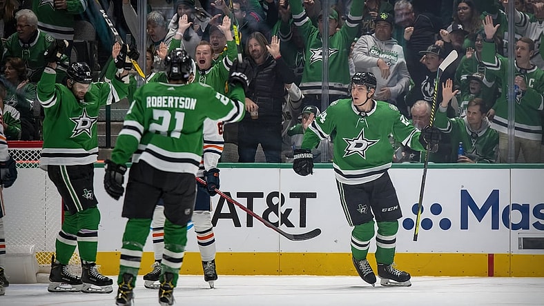 Nov 23, 2021; Dallas, Texas, USA; Dallas Stars right wing Alexander Radulov (47) and left wing Jason Robertson (21) and left wing Roope Hintz (24) celebrate a power play goal by Roope Hintz during the first period against the Edmonton Oilers at the American Airlines Center. Mandatory Credit: Jerome Miron-USA TODAY Sports