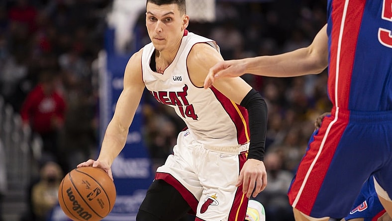 Nov 23, 2021; Detroit, Michigan, USA; Miami Heat guard Tyler Herro (14) dribbles the ball during the second quarter against the Detroit Pistons at Little Caesars Arena. Mandatory Credit: Raj Mehta-USA TODAY Sports