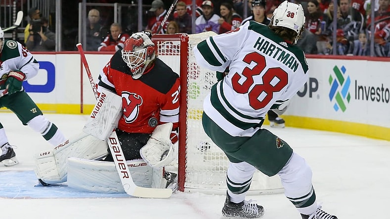 Nov 24, 2021; Newark, New Jersey, USA; New Jersey Devils goaltender Mackenzie Blackwood (29) makes a save against Minnesota Wild right wing Ryan Hartman (38) during the first period at Prudential Center. Mandatory Credit: Tom Horak-USA TODAY Sports