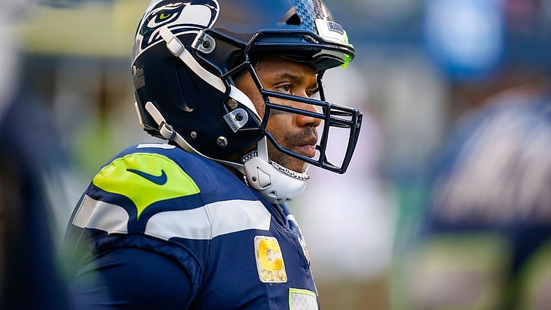 Nov 21, 2021; Seattle, Washington, USA; Seattle Seahawks quarterback Russell Wilson (3) stands on the sideline during the third quarter against the Arizona Cardinals at Lumen Field. Mandatory Credit: Joe Nicholson-USA TODAY Sports