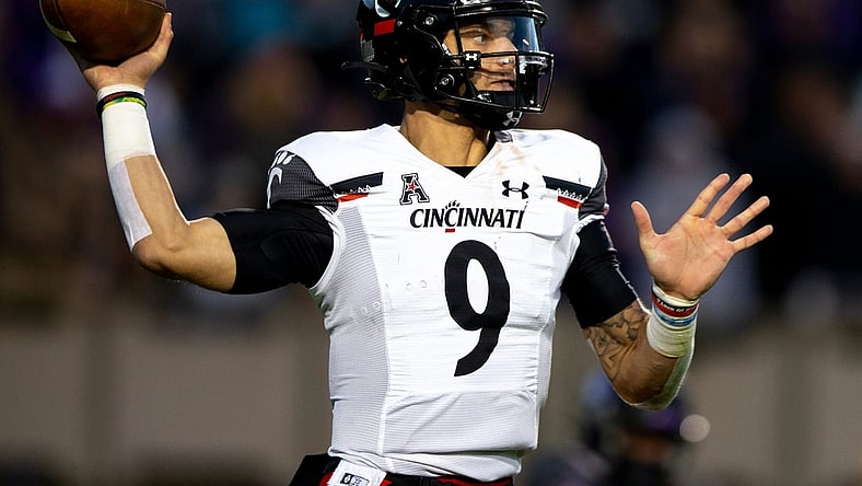 Cincinnati Bearcats quarterback Desmond Ridder (9) throws a pass in the first half of the NCAA football game between the Cincinnati Bearcats and the East Carolina Pirates at Dowdy-Ficklen Stadium in Greenville, NC, on Friday, Nov. 26, 2021.

Cincinnati Bearcats At East Carolina Pirates 20