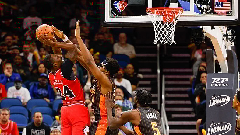 Nov 26, 2021; Orlando, Florida, USA;  Chicago Bulls forward Javonte Green (24) shoots the ball over Orlando Magic center Wendell Carter Jr. (34) in the first quarter at Amway Center. Mandatory Credit: Nathan Ray Seebeck-USA TODAY Sports