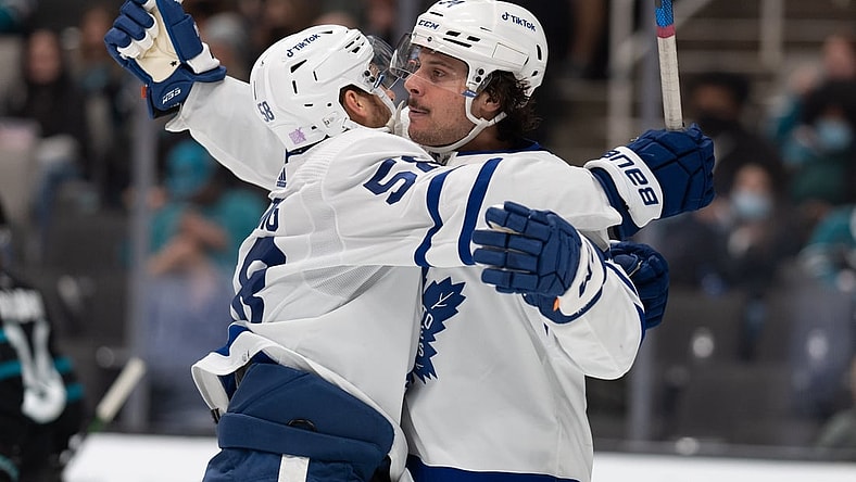Nov 26, 2021; San Jose, California, USA;  Toronto Maple Leafs left wing Michael Bunting (58) celebrates with center Auston Matthews (34) during the second period against the San Jose Sharks at SAP Center at San Jose. Mandatory Credit: Stan Szeto-USA TODAY Sports