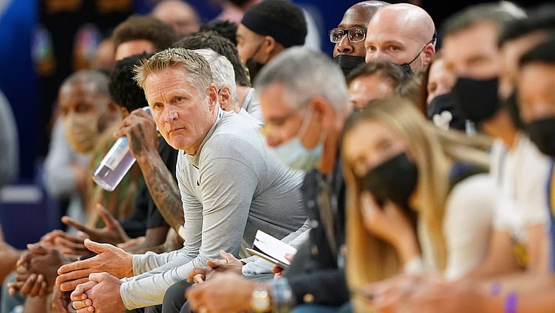 Nov 26, 2021; San Francisco, California, USA; Golden State Warriors head coach Steve Kerr sits on the bench during the fourth quarter against the Portland Trail Blazers at Chase Center. Mandatory Credit: Darren Yamashita-USA TODAY Sports