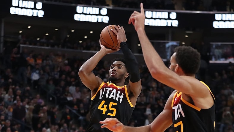 Nov 27, 2021; Salt Lake City, Utah, USA; Utah Jazz guard Donovan Mitchell (45) shoots a jump shot against the New Orleans Pelicans in the second quarter at Vivint Arena. Mandatory Credit: Rob Gray-USA TODAY Sports