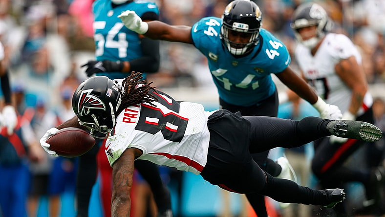 Nov 28, 2021; Jacksonville, Florida, USA;  Atlanta Falcons running back Cordarrelle Patterson (84) dives into the end zone for a touchdown in the first half against the Jacksonville Jaguars at TIAA Bank Field. Mandatory Credit: Nathan Ray Seebeck-USA TODAY Sports