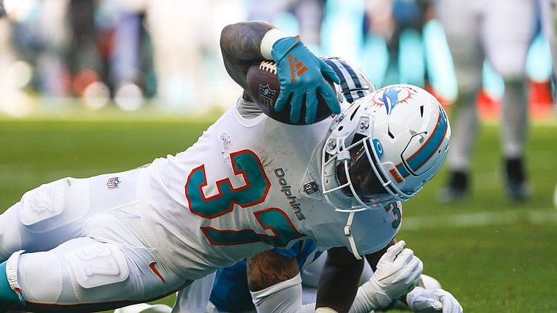 Nov 28, 2021; Miami Gardens, Florida, USA; Miami Dolphins running back Myles Gaskin (37) reaches the end zone for a touchdown against the Carolina Panthers during the second period at Hard Rock Stadium. Mandatory Credit: Sam Navarro-USA TODAY Sports