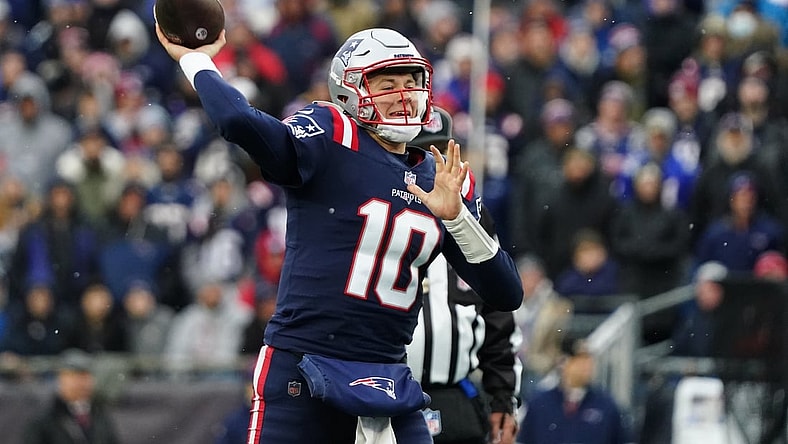 Nov 28, 2021; Foxborough, Massachusetts, USA; New England Patriots quarterback Mac Jones (10) throws a pass against the Tennessee Titans in the second quarter at Gillette Stadium. Mandatory Credit: David Butler II-USA TODAY Sports