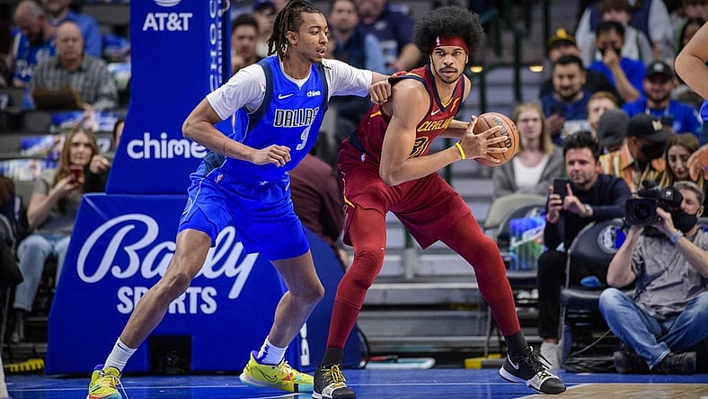 Nov 29, 2021; Dallas, Texas, USA; Dallas Mavericks center Moses Brown (9) defends against Cleveland Cavaliers center Jarrett Allen (31) during the first quarter at American Airlines Center. Mandatory Credit: Jerome Miron-USA TODAY Sports