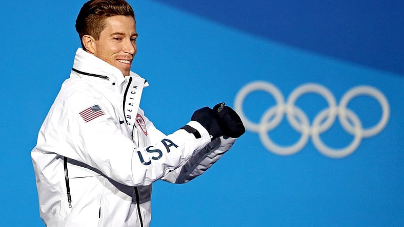 Feb 14, 2018; Pyeongchang, South Korea; Shaun White of the United States celebrates winning gold during the medals ceremony for the Men's Snowboard Halfpipe in the Pyeongchang 2018 Olympic Winter Games at Medals Plaza. Mandatory Credit: Soobum Im-USA TODAY Sports