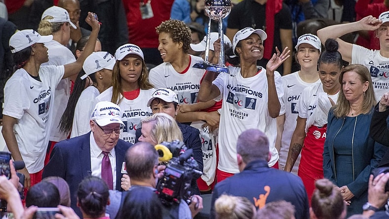 Oct 10, 2019; Washington, DC, USA; Washington Mystics players celebrate with the championship trophy after defeating Connecticut Sun in game five of the 2019 WNBA Finals at Entertainment and Sports Ar. Mandatory Credit: Brad Mills-USA TODAY Sports