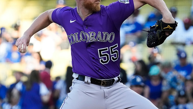 Aug 28, 2021; Los Angeles, California, USA; Colorado Rockies starting pitcher Jon Gray (55) throws a pitch in the first inning against the Los Angeles Dodgers at Dodger Stadium. Mandatory Credit: Robert Hanashiro-USA TODAY Sports