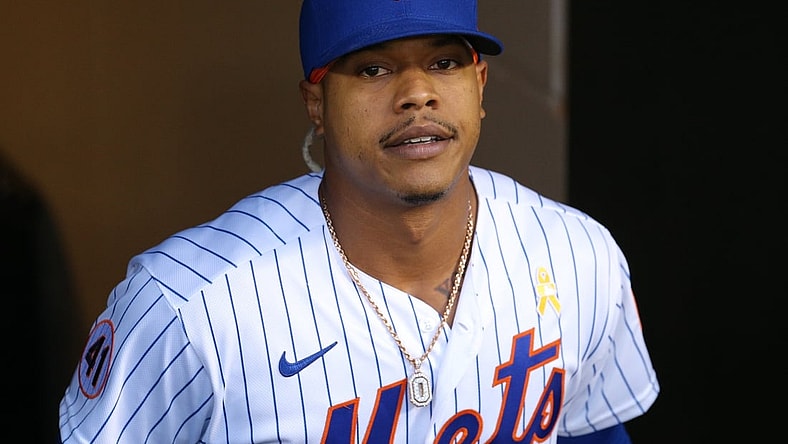 Sep 14, 2021; New York City, New York, USA; New York Mets starting pitcher Marcus Stroman (0) exits the dugout to begin warming up before his start against the St. Louis Cardinals at Citi Field. Mandatory Credit: Brad Penner-USA TODAY Sports