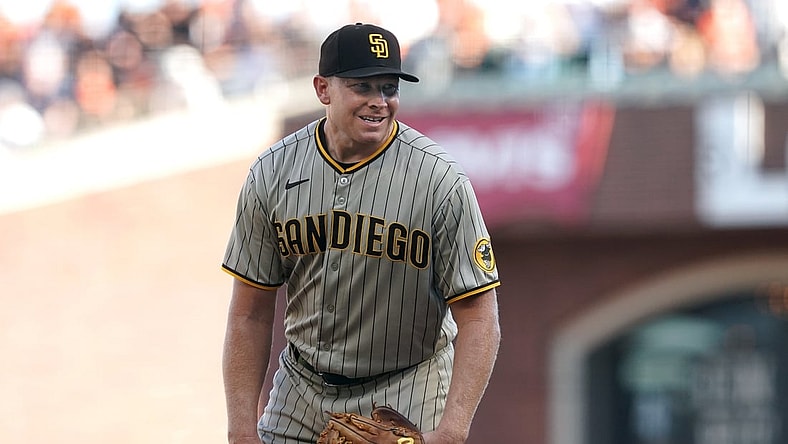 Oct 2, 2021; San Francisco, California, USA; San Diego Padres relief pitcher Mark Melancon (33) prepares to pitch during the tenth inning against the San Francisco Giants at Oracle Park. Mandatory Credit: Darren Yamashita-USA TODAY Sports