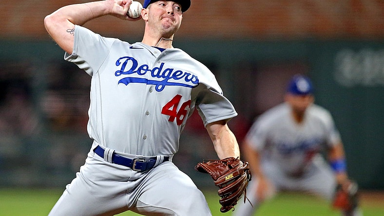 Oct 23, 2021; Cumberland, Georgia, USA; Los Angeles Dodgers relief pitcher Corey Knebel (46) pitches during the seventh inning against the Atlanta Braves in game six of the 2021 NLCS at Truist Park. Mandatory Credit: Brett Davis-USA TODAY Sports