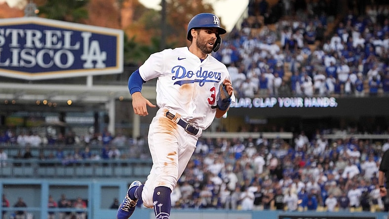 Oct 19, 2021; Los Angeles, California, USA; Los Angeles Dodgers left fielder Chris Taylor (3) rounds third base against the Atlanta Braves in the eighth inning during game three of the 2021 NLCS at Dodger Stadium. The Dodgers defeated the Braves 6-5. Mandatory Credit: Kirby Lee-USA TODAY Sports