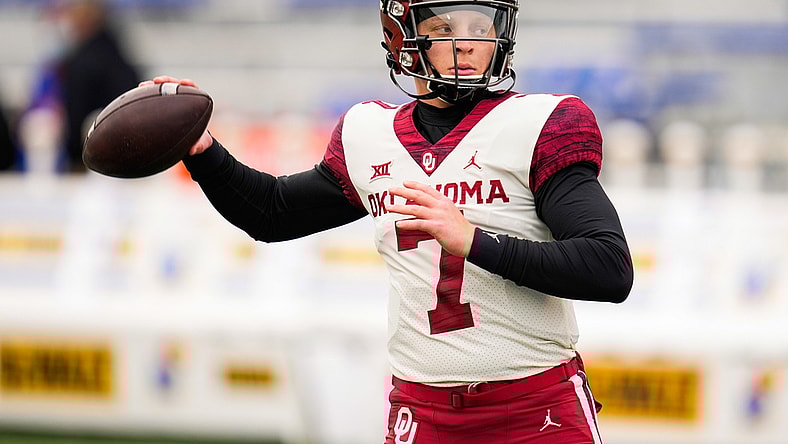 Oct 23, 2021; Lawrence, Kansas, USA; Oklahoma Sooners quarterback Spencer Rattler (7) warms up before the game against the Kansas Jayhawks at David Booth Kansas Memorial Stadium. Mandatory Credit: Jay Biggerstaff-USA TODAY Sports