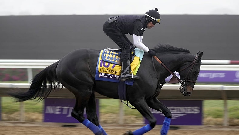 Nov 3, 2021; Del Mar, CA, USA;  Medina Spirit runs during morning workouts at Del Mar Race Track. Mandatory Credit: Ray Acevedo-USA TODAY Sports