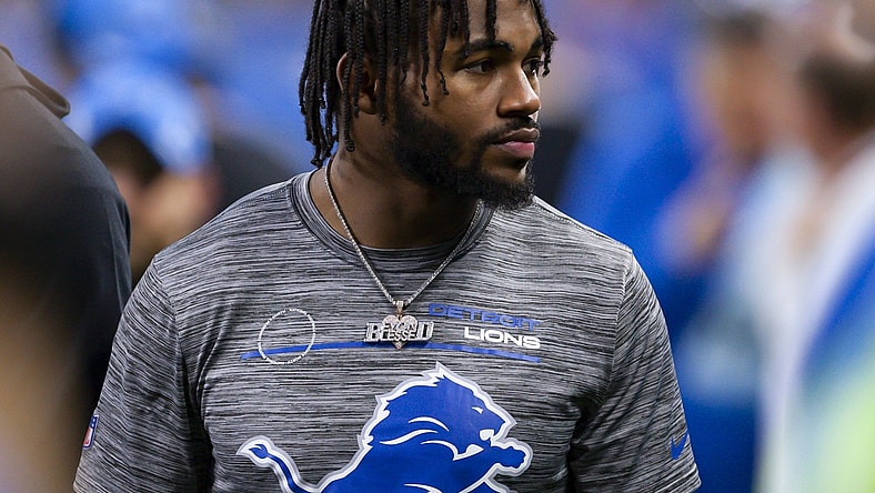 Nov 25, 2021; Detroit, Michigan, USA; Detroit Lions running back D'Andre Swift (32) stands on the sidelines during the third quarter against the Chicago Bears at Ford Field. Mandatory Credit: Raj Mehta-USA TODAY Sports