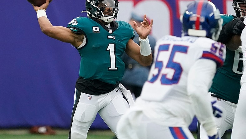 Nov 28, 2021; East Rutherford, NJ, USA; Philadelphia Eagles quarterback Jalen Hurts (1) throws against the New York Giants at MetLife Stadium. Mandatory Credit: Robert Deutsch-USA TODAY Sports