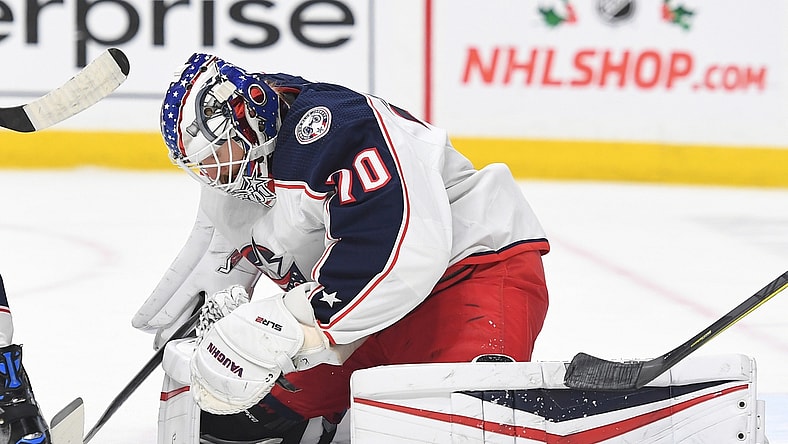 Nov 30, 2021; Nashville, Tennessee, USA; Columbus Blue Jackets goaltender Joonas Korpisalo (70) makes a save during the first period against the Nashville Predators at Bridgestone Arena. Mandatory Credit: Christopher Hanewinckel-USA TODAY Sports