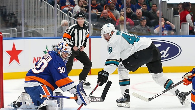 Dec 2, 2021; Elmont, New York, USA; New York Islanders goaltender Ilya Sorokin (30) makes a save against San Jose Sharks center Tomas Hertl (48) during the first period at UBS Arena. Mandatory Credit: Tom Horak-USA TODAY Sports