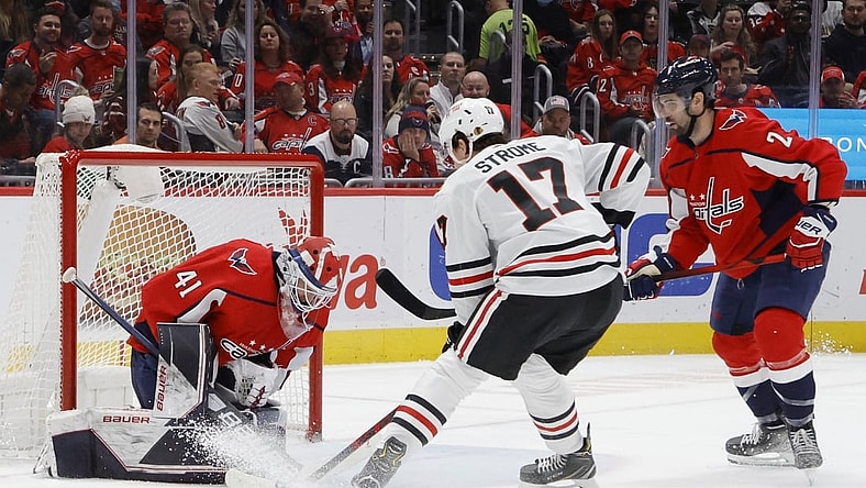 Dec 2, 2021; Washington, District of Columbia, USA; Washington Capitals goaltender Vitek Vanecek (41) makes a save on Chicago Blackhawks center Dylan Strome (17) during the second period at Capital One Arena. Mandatory Credit: Geoff Burke-USA TODAY Sports