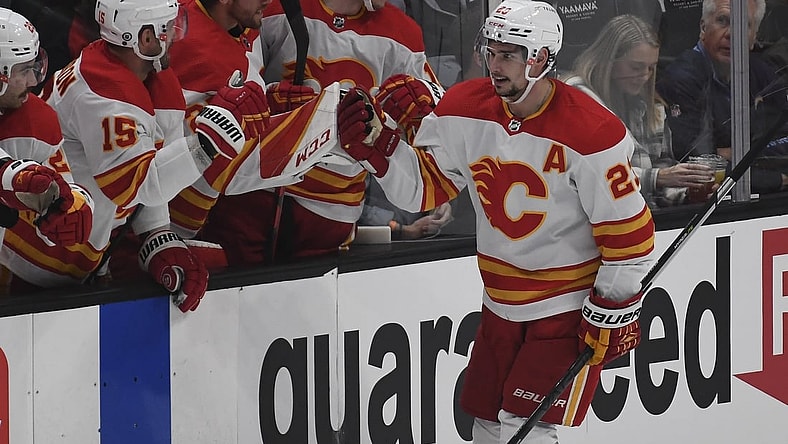 Dec 3, 2021; Anaheim, California, USA;  Calgary Flames forward Sean Monahan (23) celebrates his goal against Anaheim Ducks goaltender John Gibson (36) (not pictured) during the second period at Honda Center. Mandatory Credit: Richard Mackson-USA TODAY Sports