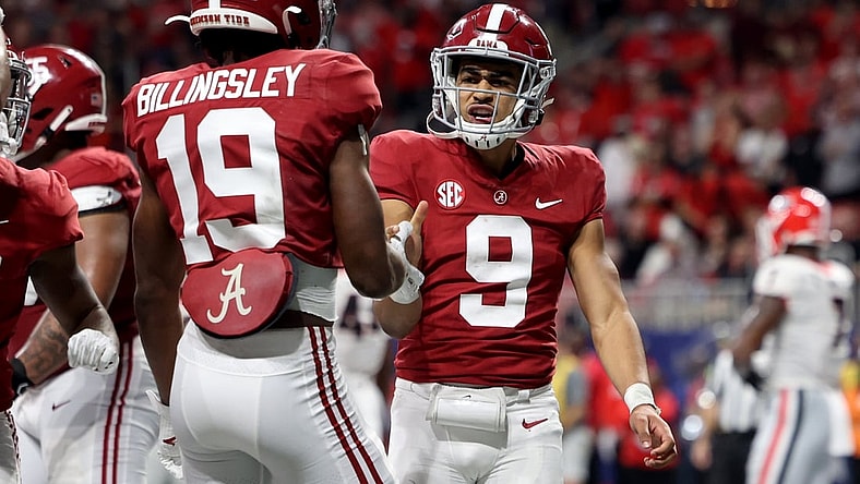 Dec 4, 2021; Atlanta, GA, USA; Alabama Crimson Tide quarterback Bryce Young (9) celebrates his rushing touchdown with tight end Jahleel Billingsley (19) during the second quarter against the Georgia Bulldogs in the SEC championship game at Mercedes-Benz Stadium. Mandatory Credit: Jason Getz-USA TODAY Sports