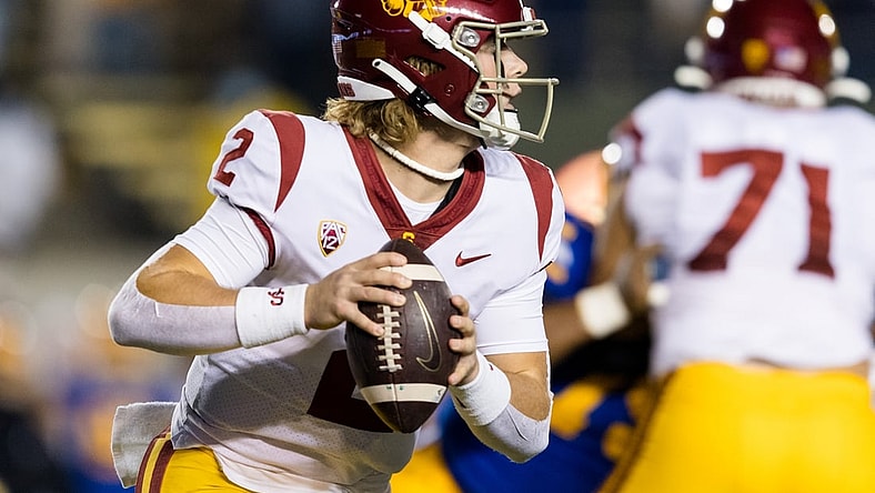 Dec 4, 2021; Berkeley, California, USA; USC Trojans quarterback Jaxson Dart (2) run the ball against the California Golden Bears during the first quarter at FTX Field at California Memorial Stadium. Mandatory Credit: John Hefti-USA TODAY Sports
