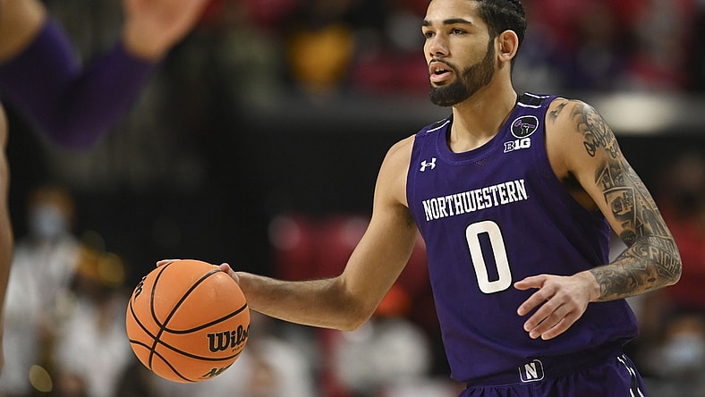 Dec 5, 2021; College Park, Maryland, USA;  Northwestern Wildcats guard Boo Buie (0) looks to pass during the first half against the Maryland Terrapins at Xfinity Center. Mandatory Credit: Tommy Gilligan-USA TODAY Sports