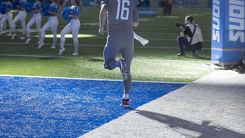 Dec 5, 2021; Detroit, Michigan, USA; Detroit Lions quarterback Jared Goff (16) runs onto the field before the start of the game against the Minnesota Vikings at Ford Field. Mandatory Credit: David Reginek-USA TODAY Sports