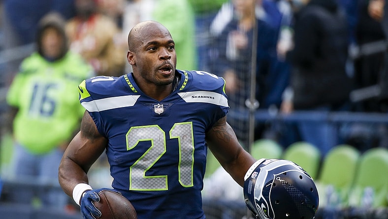 Dec 5, 2021; Seattle, Washington, USA; Seattle Seahawks running back Adrian Peterson (21) returns to the locker room following pregame warmups against the San Francisco 49ers at Lumen Field. Mandatory Credit: Joe Nicholson-USA TODAY Sports