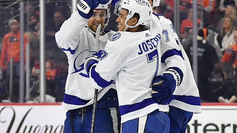 Dec 5, 2021; Philadelphia, Pennsylvania, USA; Tampa Bay Lightning right wing Mathieu Joseph (7) celebrates his shorthanded goal with defenseman Jan Rutta (44) and defenseman Victor Hedman (77) against the Philadelphia Flyers during the second period at Wells Fargo Center. Mandatory Credit: Eric Hartline-USA TODAY Sports